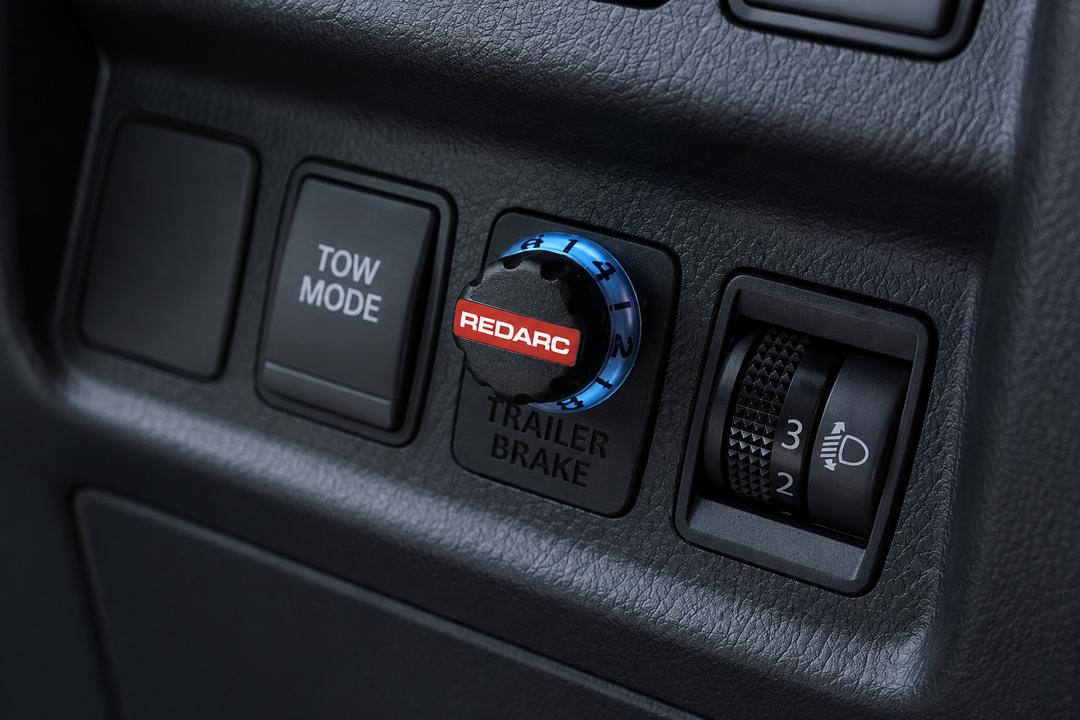 REDARC trailer brake controller flush-mounted in a 4x4 dashboard
